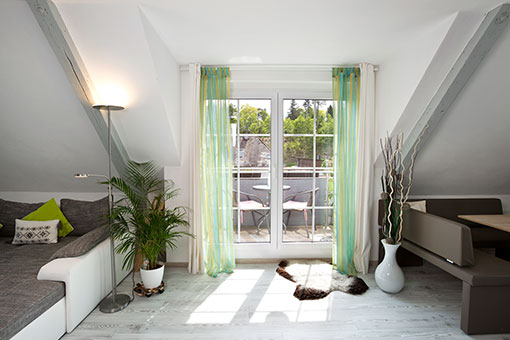 Die neue Dachgaube mit integrierten Balkon und bodentiefen Fenstern